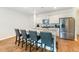 Modern kitchen with island, granite countertops, and stainless steel appliances at 314 Black Birch Dr, Summerville, SC 29486