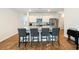 Modern kitchen with island, granite countertops, and stainless steel appliances at 314 Black Birch Dr, Summerville, SC 29486