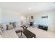 Spacious living room with sectional sofa and wet bar at 314 Black Birch Dr, Summerville, SC 29486