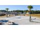 Community playground with a unique concrete play area at 314 Black Birch Dr, Summerville, SC 29486