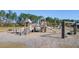 Wooden playground structure with slides, climbing features, and swings at 314 Black Birch Dr, Summerville, SC 29486