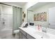 Clean bathroom with tub and gray vanity at 616 Red Monarch Way, Moncks Corner, SC 29461