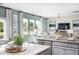 Modern kitchen with granite countertops and stainless steel appliances at 616 Red Monarch Way, Moncks Corner, SC 29461