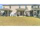 Spacious backyard with patio, screened porch, and grilling area at 7833 Montview Rd, North Charleston, SC 29418