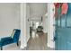 Bright and airy entryway with hardwood floors, leading to living room at 7833 Montview Rd, North Charleston, SC 29418