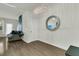 Bright and spacious hallway with large circular mirror at 7833 Montview Rd, North Charleston, SC 29418