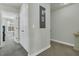 Home hallway with doors leading to bedrooms at 7833 Montview Rd, North Charleston, SC 29418