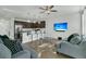 Open-concept kitchen with stainless steel appliances and breakfast bar at 7833 Montview Rd, North Charleston, SC 29418