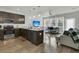 Open kitchen with stainless steel appliances and island seating at 7833 Montview Rd, North Charleston, SC 29418
