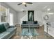 Spacious living room featuring a gray sofa and a glass coffee table at 7833 Montview Rd, North Charleston, SC 29418