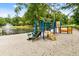 playground with sand and play equipment near pond at 7833 Montview Rd, North Charleston, SC 29418
