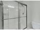 Clean bathroom with a glass enclosed shower and tiled walls at 7833 Montview Rd, North Charleston, SC 29418