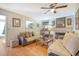 Living room with a fireplace, hardwood floors, and neutral furniture at 7986 Highway 162, Hollywood, SC 29449