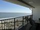 Relaxing balcony overlooking the ocean and sandy beach at 9002 Palmetto (1/13 Share) Dr # 517, Isle of Palms, SC 29451