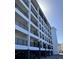 Multi-story building with parking and balconies at 9002 Palmetto (1/13 Share) Dr # 517, Isle of Palms, SC 29451