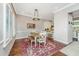 Dining room features chandelier, wood table, and access to kitchen at 1011 Lighterman Way, Charleston, SC 29412