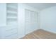 Bedroom with built-in shelving and large closet at 110 Edgebrook Dr # 28, Summerville, SC 29486