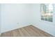 Simple bedroom with a large window and laminate flooring at 110 Edgebrook Dr # 28, Summerville, SC 29486