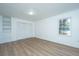Bright bedroom with hardwood floors, built-in shelves, and large closet at 110 Edgebrook Dr # 28, Summerville, SC 29486