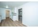 Simple kitchen featuring white cabinets and laminate flooring at 110 Edgebrook Dr # 28, Summerville, SC 29486