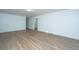 Large living room with light walls and laminate wood flooring at 110 Edgebrook Dr # 28, Summerville, SC 29486