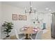 Bright dining area with a round table and chairs, adjacent to an updated kitchen at 114 Stephanie Cir, Summerville, SC 29483