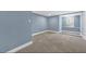 Finished basement room with window and neutral carpeting at 118 Carter, Walterboro, SC 29488