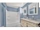 Elegant bathroom with double vanity and a large soaking tub at 118 Carter, Walterboro, SC 29488