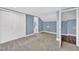 Spacious bedroom with carpet, double doors, and ensuite bathroom access at 118 Carter, Walterboro, SC 29488