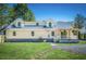 Rear view of remodeled home with large yard and patio at 118 Carter, Walterboro, SC 29488