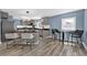 Modern kitchen with island, stainless steel appliances, and breakfast bar at 118 Carter, Walterboro, SC 29488