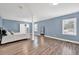 Bright main bedroom with ensuite bathroom and hardwood floors at 118 Carter, Walterboro, SC 29488