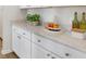 White kitchen counter with ample storage and quartz countertop at 184 Belfort Pl, Summerville, SC 29486