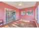 Sunroom with hardwood floors, sliding glass doors and a ceiling fan at 212 Windsor Mill Rd, Goose Creek, SC 29445