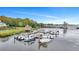 Waterfront boat dock with several boats and gazebo at 2347 Tall Sail Dr # J, Charleston, SC 29414