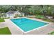 Community pool with surrounding patio and landscaping at 2347 Tall Sail Dr # J, Charleston, SC 29414