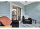 Relaxing screened porch with outdoor seating and wooded views at 2347 Tall Sail Dr # J, Charleston, SC 29414