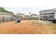 Backyard with wooden fence, fire pit, and hammock at 2652 Doubletree Ct, Charleston, SC 29414