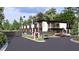 Modern building exterior with gated entrance and ample parking for luxury vehicles at 3100 Fickling Hill Rd # 6, Johns Island, SC 29455