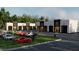 Modern commercial building with large garage doors and ample parking. Ideal for car enthusiasts at 3100 Fickling Hill Rd # 8, Johns Island, SC 29455