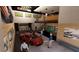 High-end garage with a bar, large screen TVs, and a red sports car at 3100 Fickling Hill Rd # 8, Johns Island, SC 29455