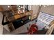 Two-story garage with a loft, modern finishes, and a red sports car in the center at 3100 Fickling Hill Rd # 8, Johns Island, SC 29455