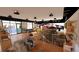 Sophisticated lounge area with comfortable seating, large windows, and racing-themed decor at 3100 Fickling Hill Rd # 8, Johns Island, SC 29455