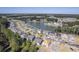 Aerial view of a neighborhood with a lake at 311 Calm Water Way, Summerville, SC 29486