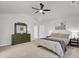 Spacious primary bedroom with carpeted floors and plenty of natural light at 496 Oak View Way, Summerville, SC 29483