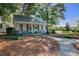 Charming white cottage coffee house with outdoor seating at 496 Oak View Way, Summerville, SC 29483