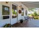 Coffee house porch with inviting seating and decor at 496 Oak View Way, Summerville, SC 29483