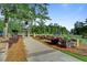 Community entrance with brick pathway and landscaping at 496 Oak View Way, Summerville, SC 29483