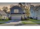 Two-story home with gray siding and a two-car garage at 496 Oak View Way, Summerville, SC 29483