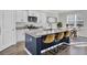 Modern kitchen with white cabinets, granite countertops and a large island at 496 Oak View Way, Summerville, SC 29483